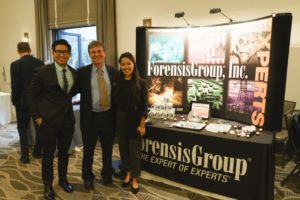 Mark Treitel with Diamond Sponsor Forensis Group booth at Washington in the West 2019